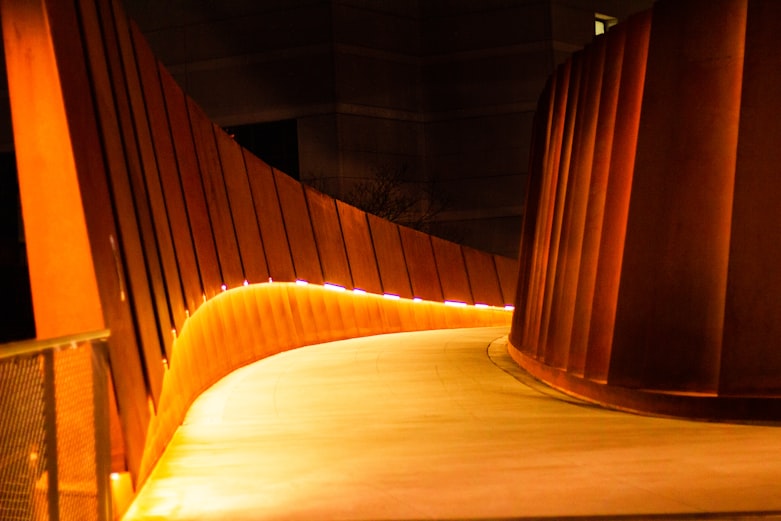 brown wooden tunnel with yellow light