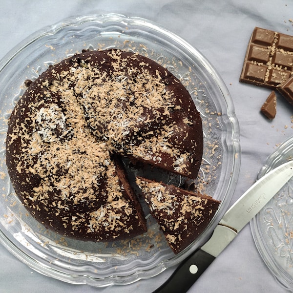 chocolate cake on clear glass plate