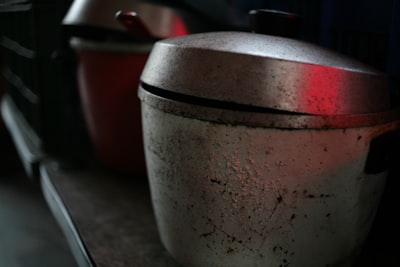 white and silver container on white table drink teams background