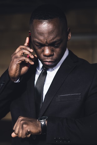 man in black suit jacket