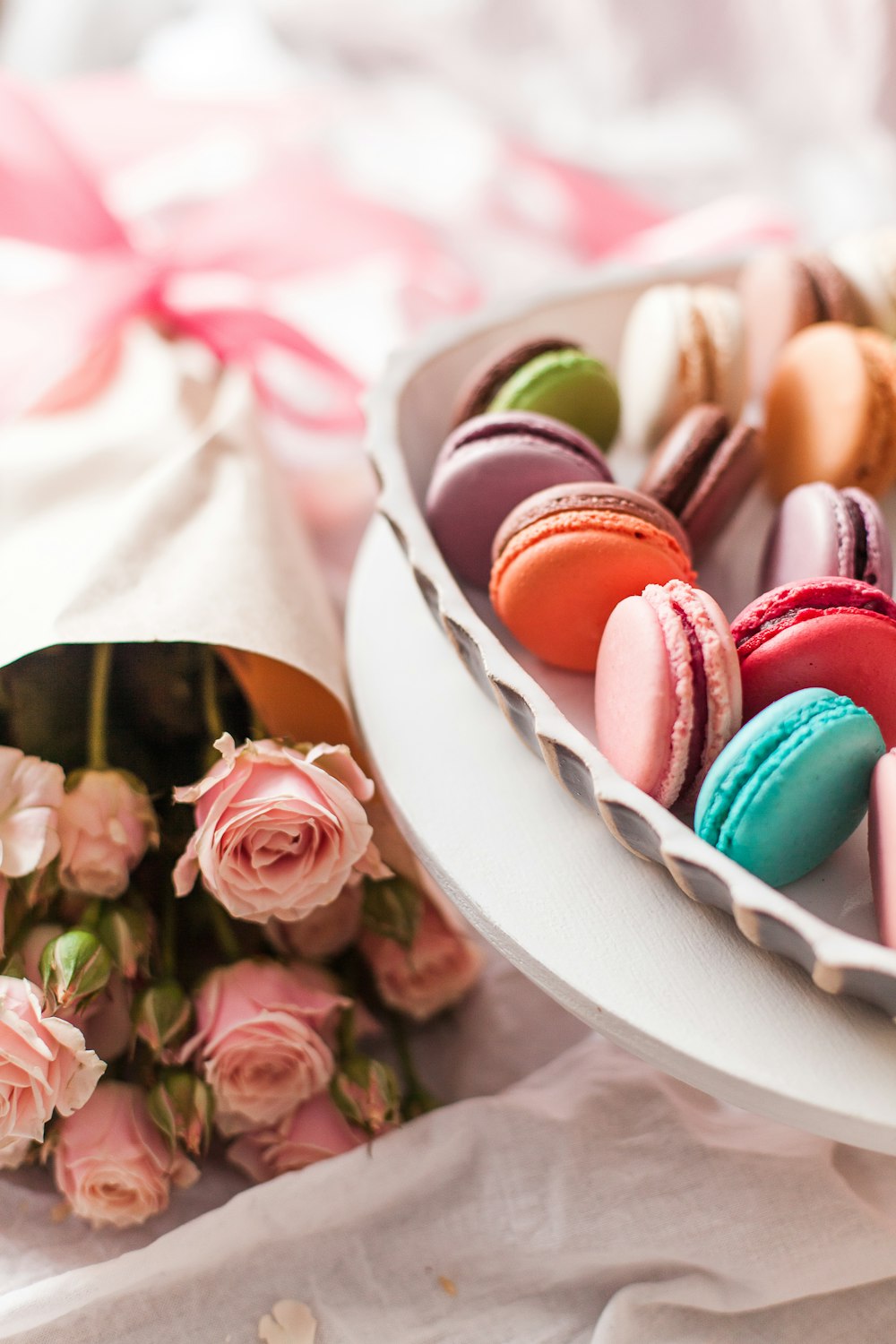 pink roses on white round plate