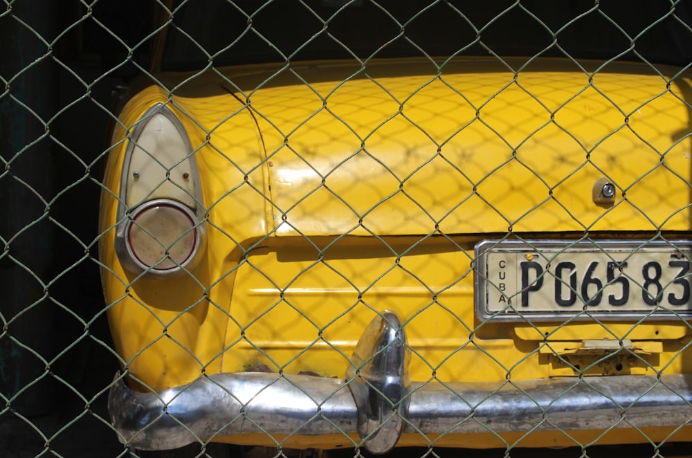 yellow car with license plate