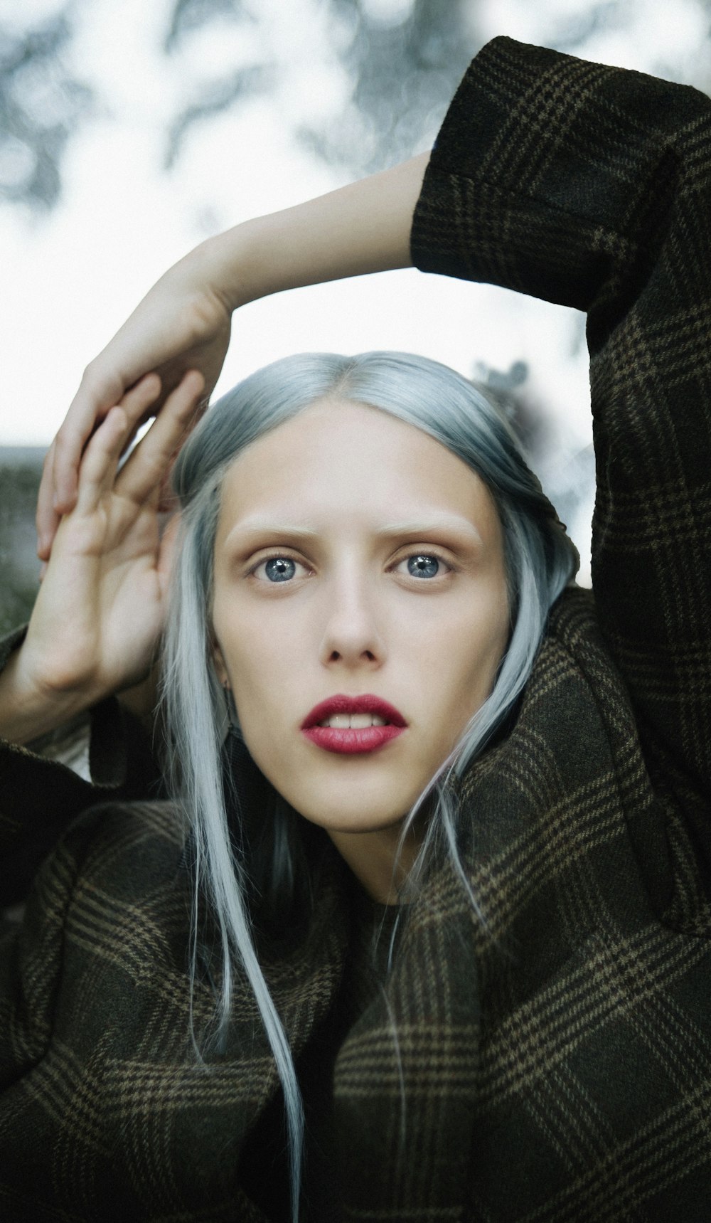 woman in black and gray scarf