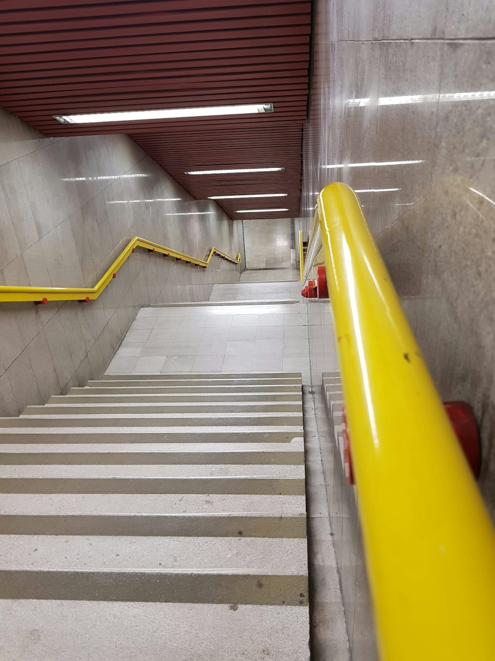 yellow and gray concrete staircase