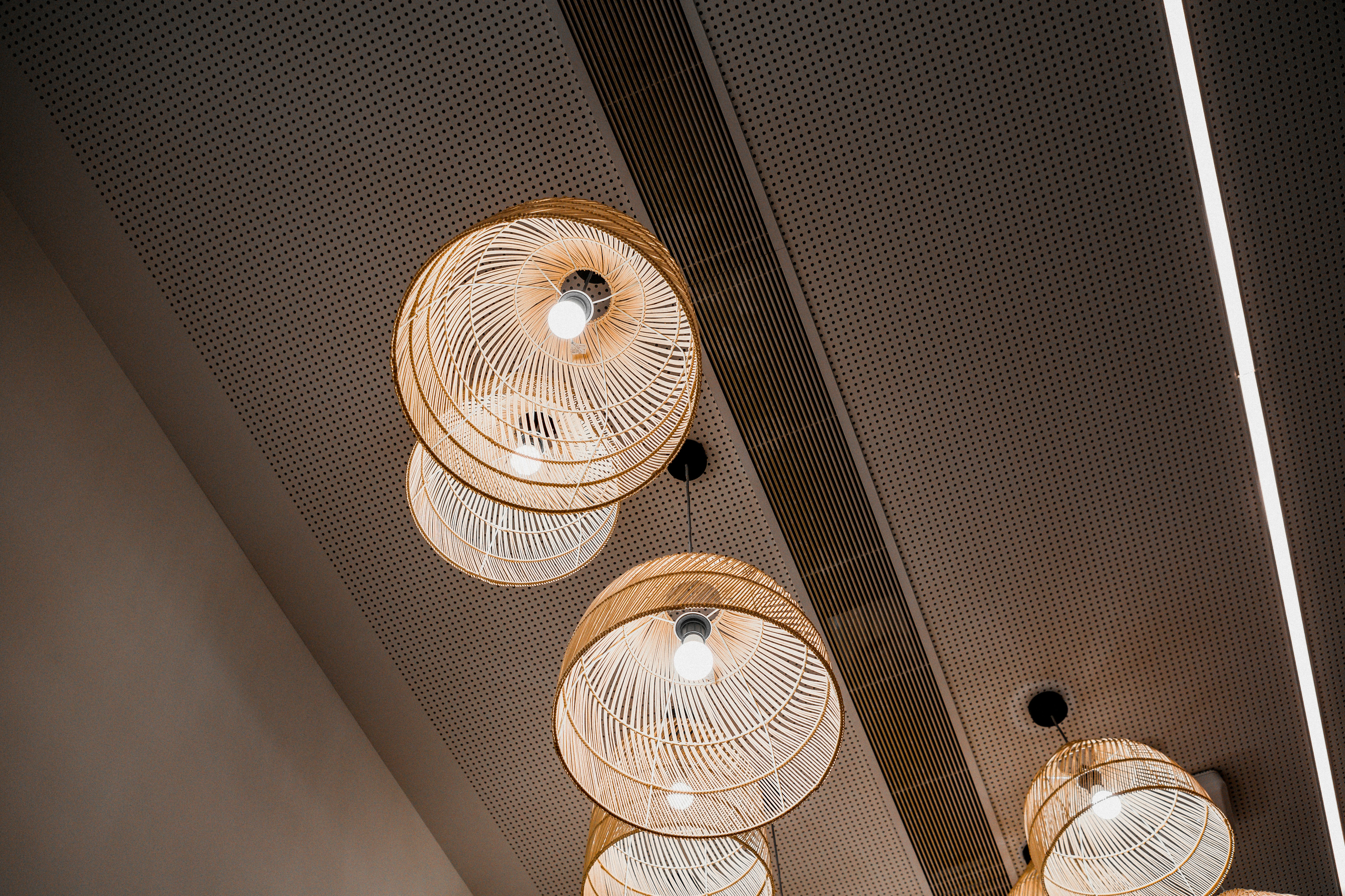 white and brown pendant lamps