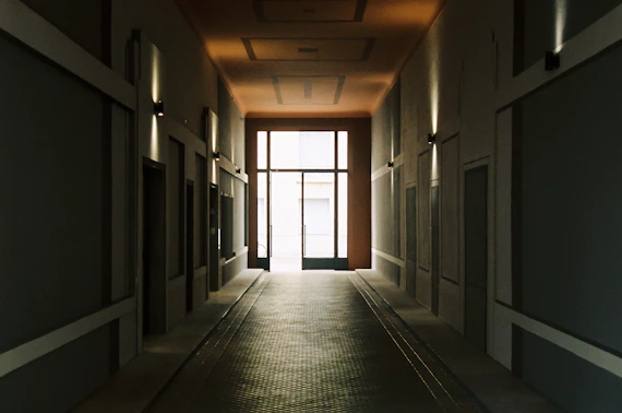 empty hallway with glass windows