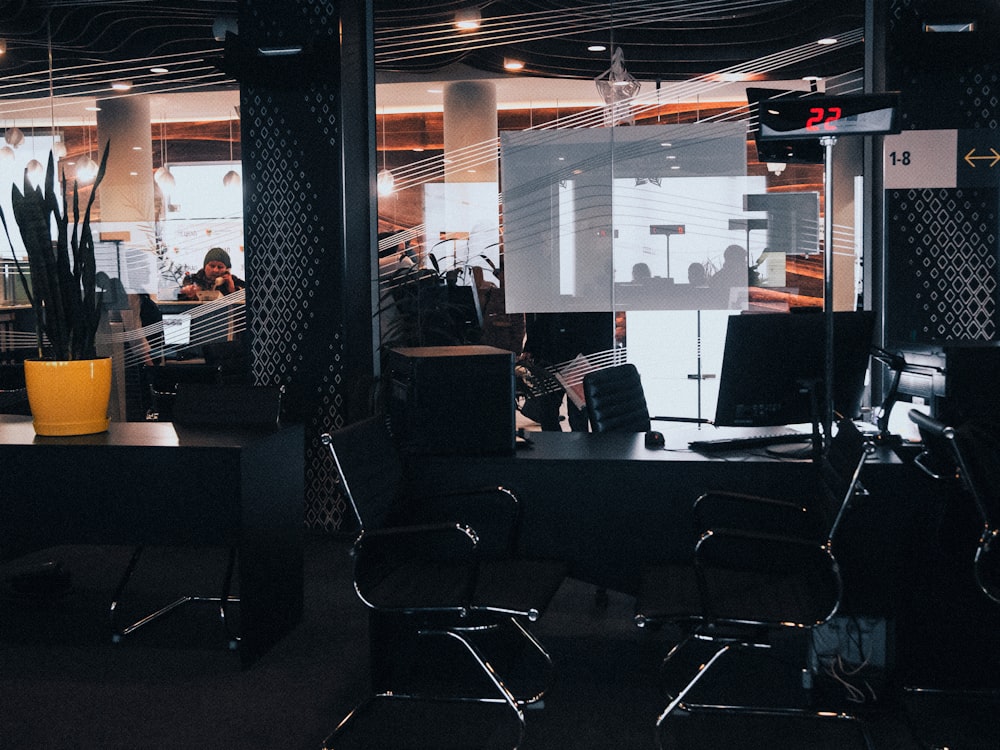 black and gray chairs inside room