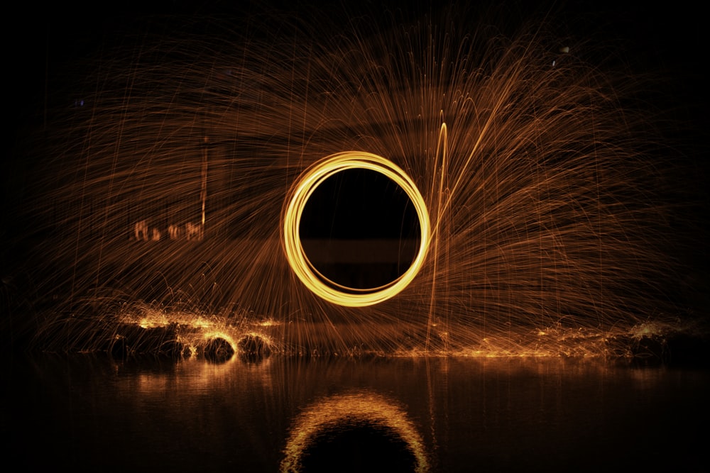 steel wool photography of person in water