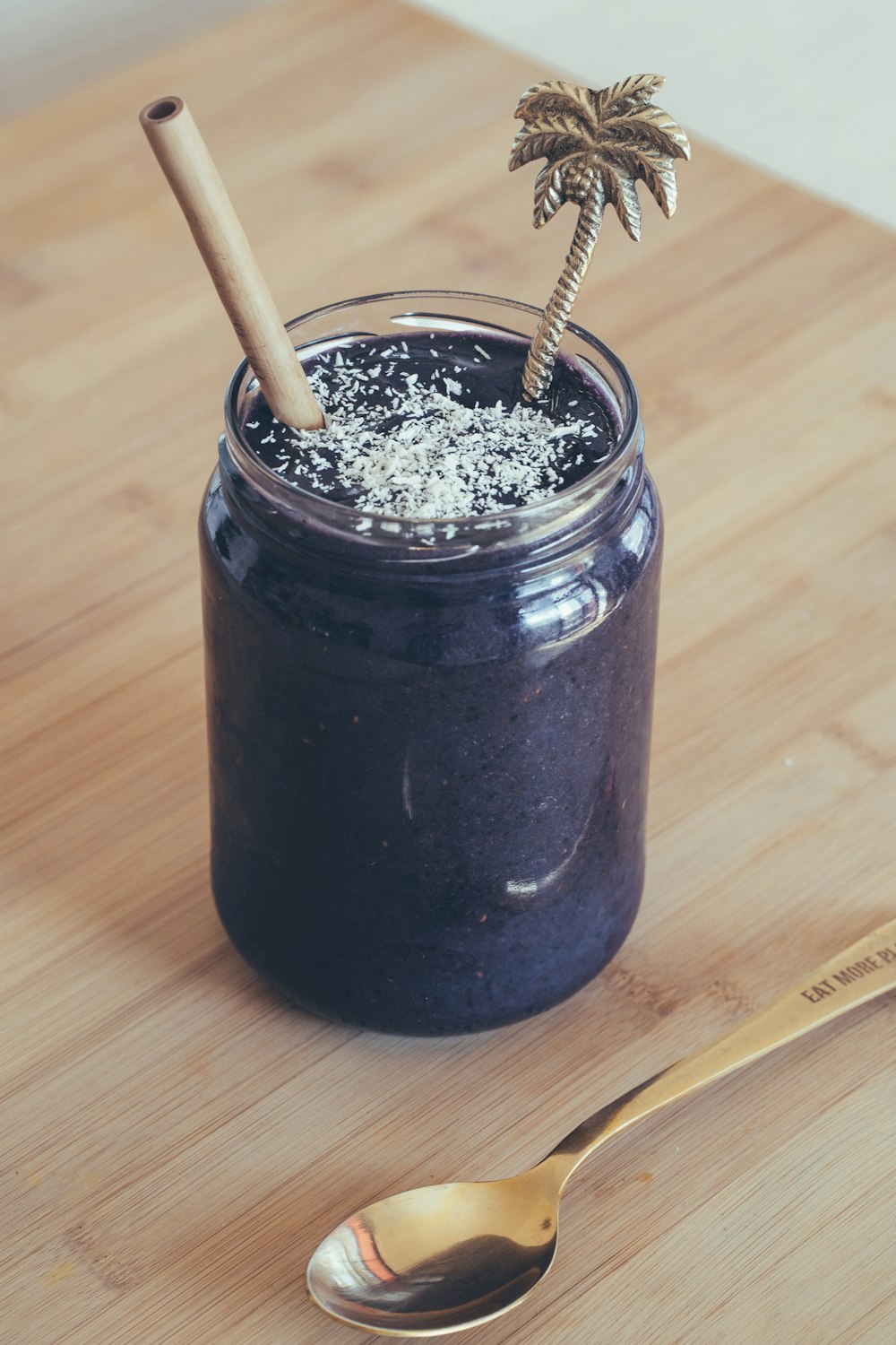 clear glass jar with brown powder