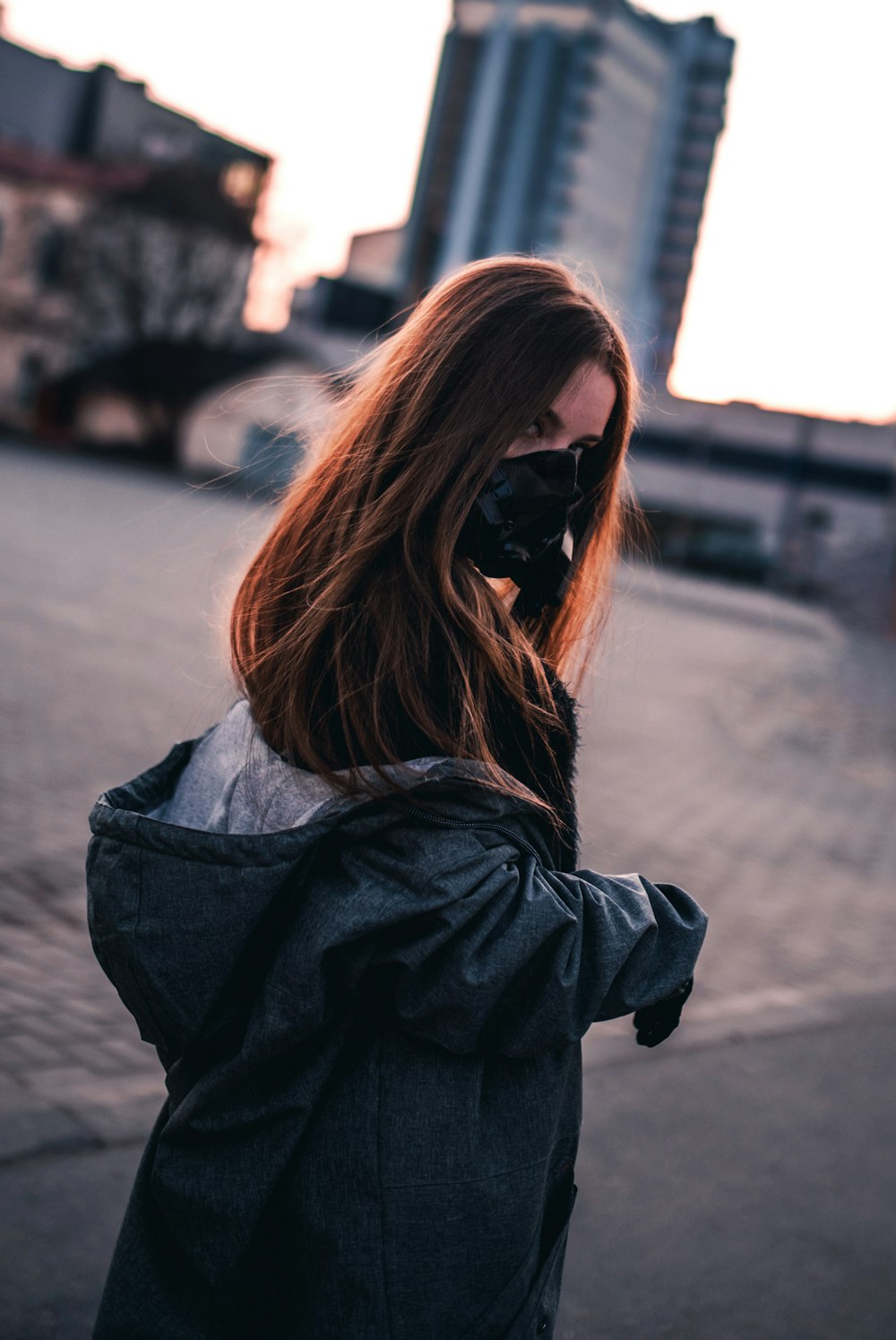 woman in black jacket and black sunglasses