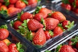 strawberries on clear plastic container
