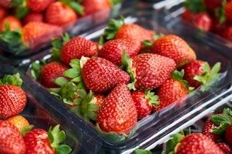 strawberries on clear plastic container