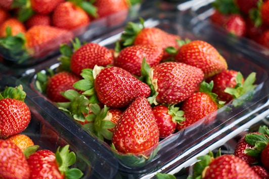 strawberries on clear plastic container