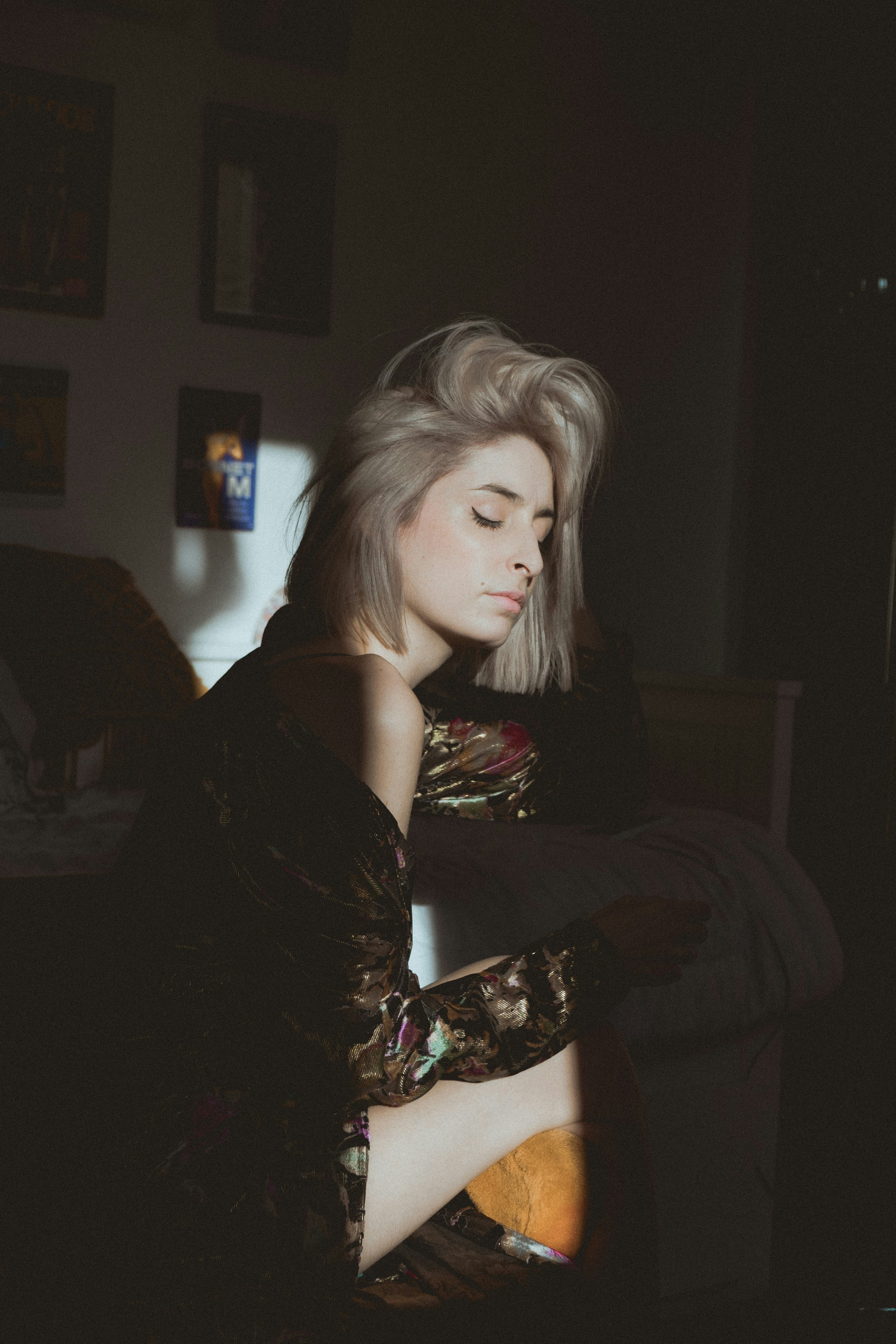 woman in black sleeveless dress