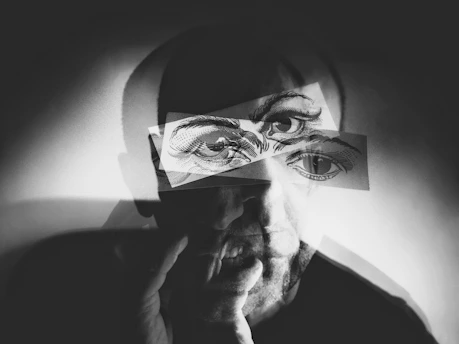 man in black and white mask