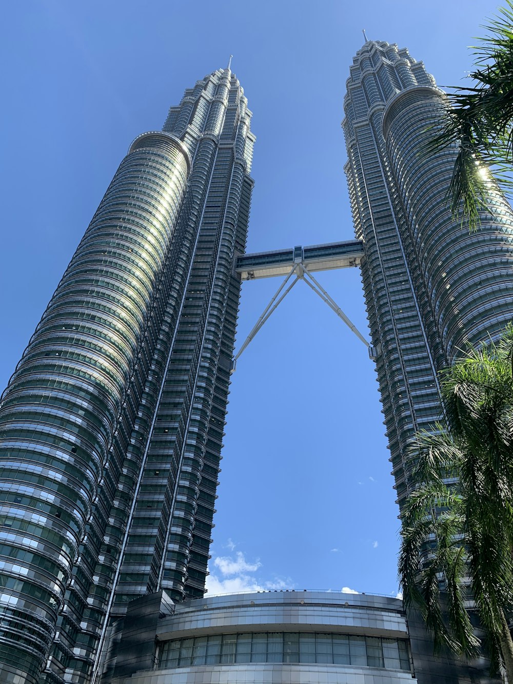 low angle photography of gray high rise building