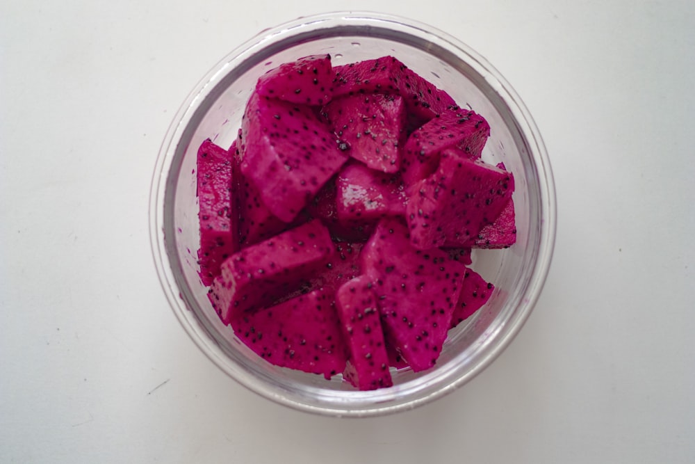 sliced watermelon in clear glass bowl