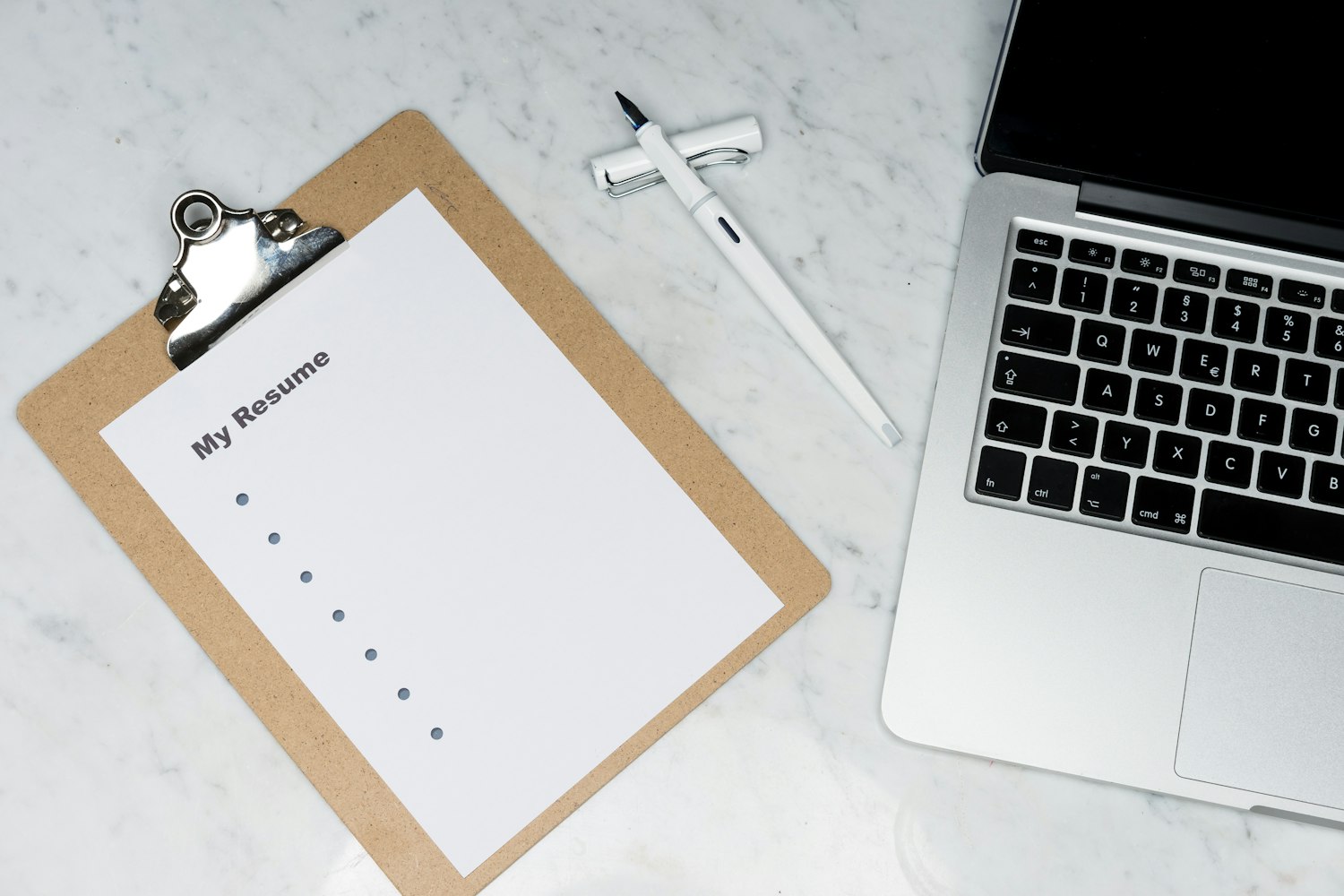 Person writing job descriptions