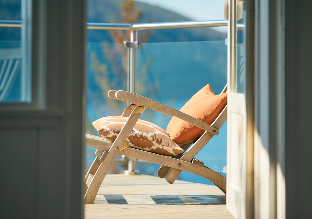 brown wooden folding chair on gray concrete floor