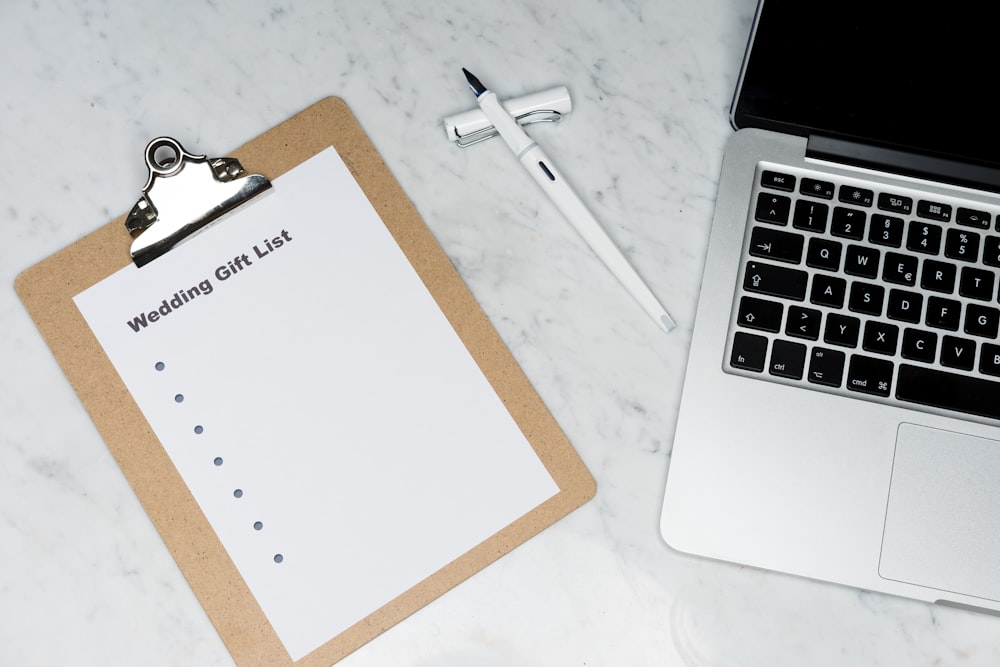 white paper on brown wooden table