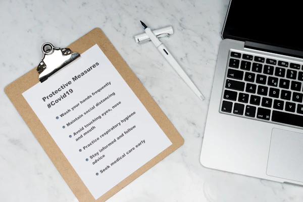 One-Year Post-Remodel Review: white and brown card on silver macbook