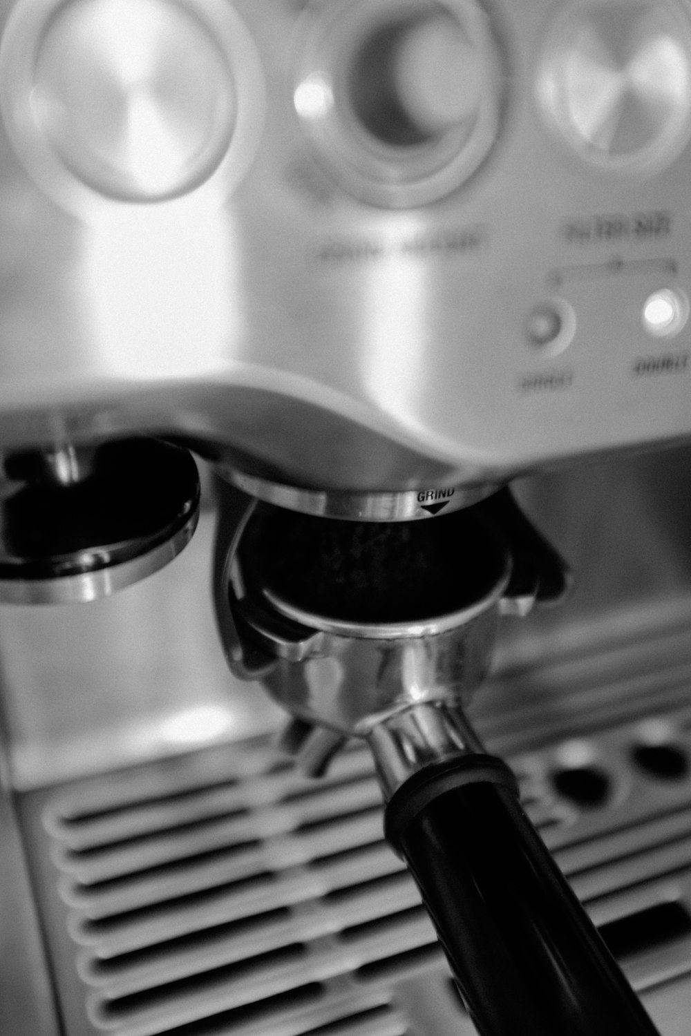 silver and black espresso machine