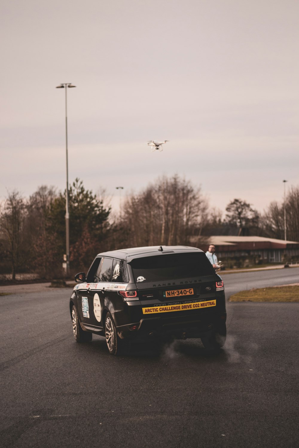 black ford mustang on road during daytime