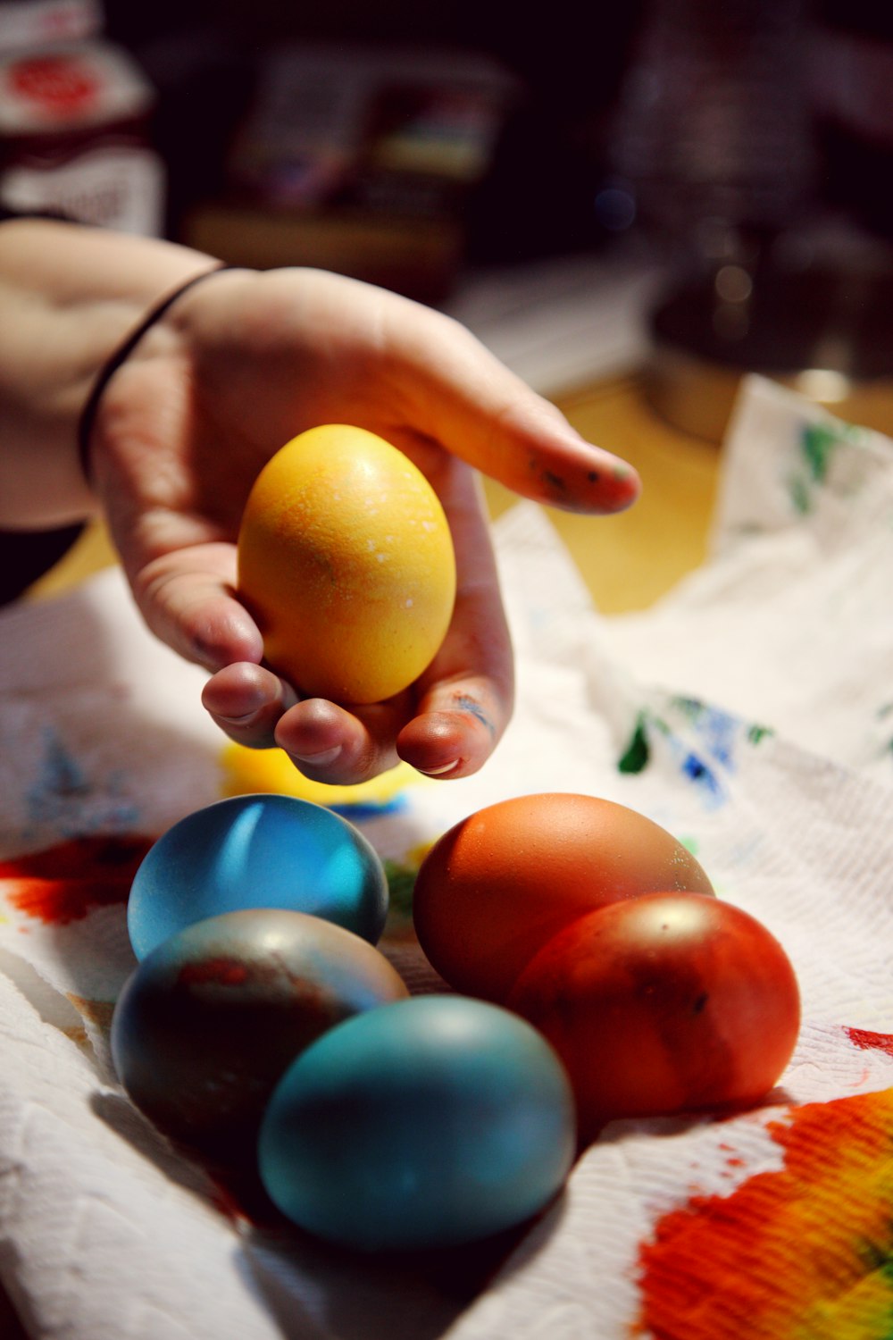 person holding yellow lemon fruit