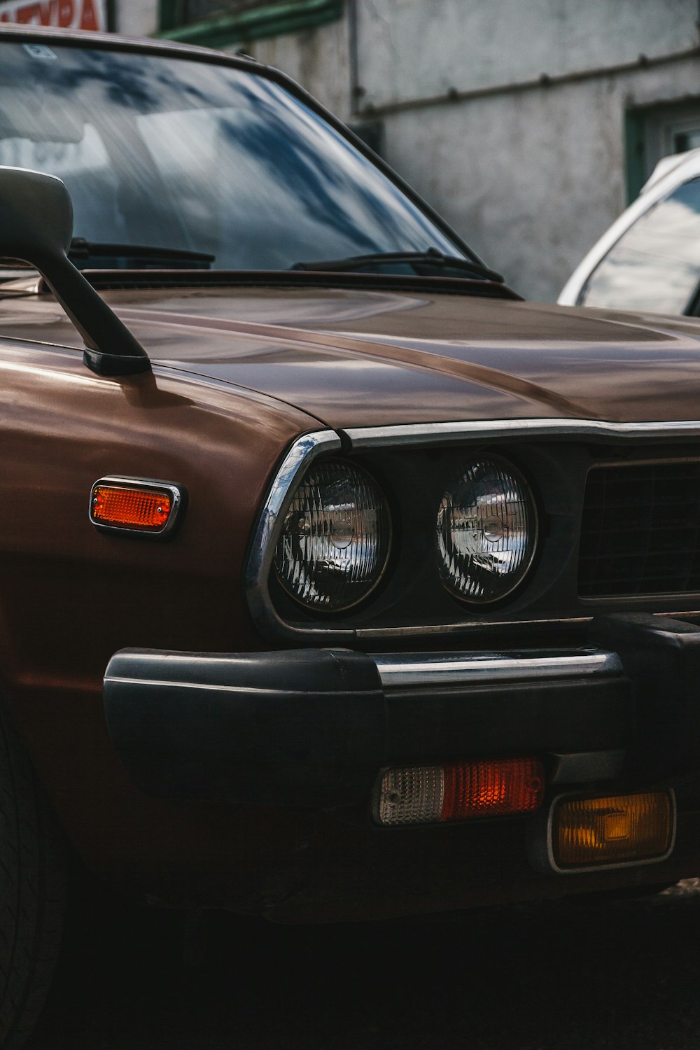 black bmw car in close up photography