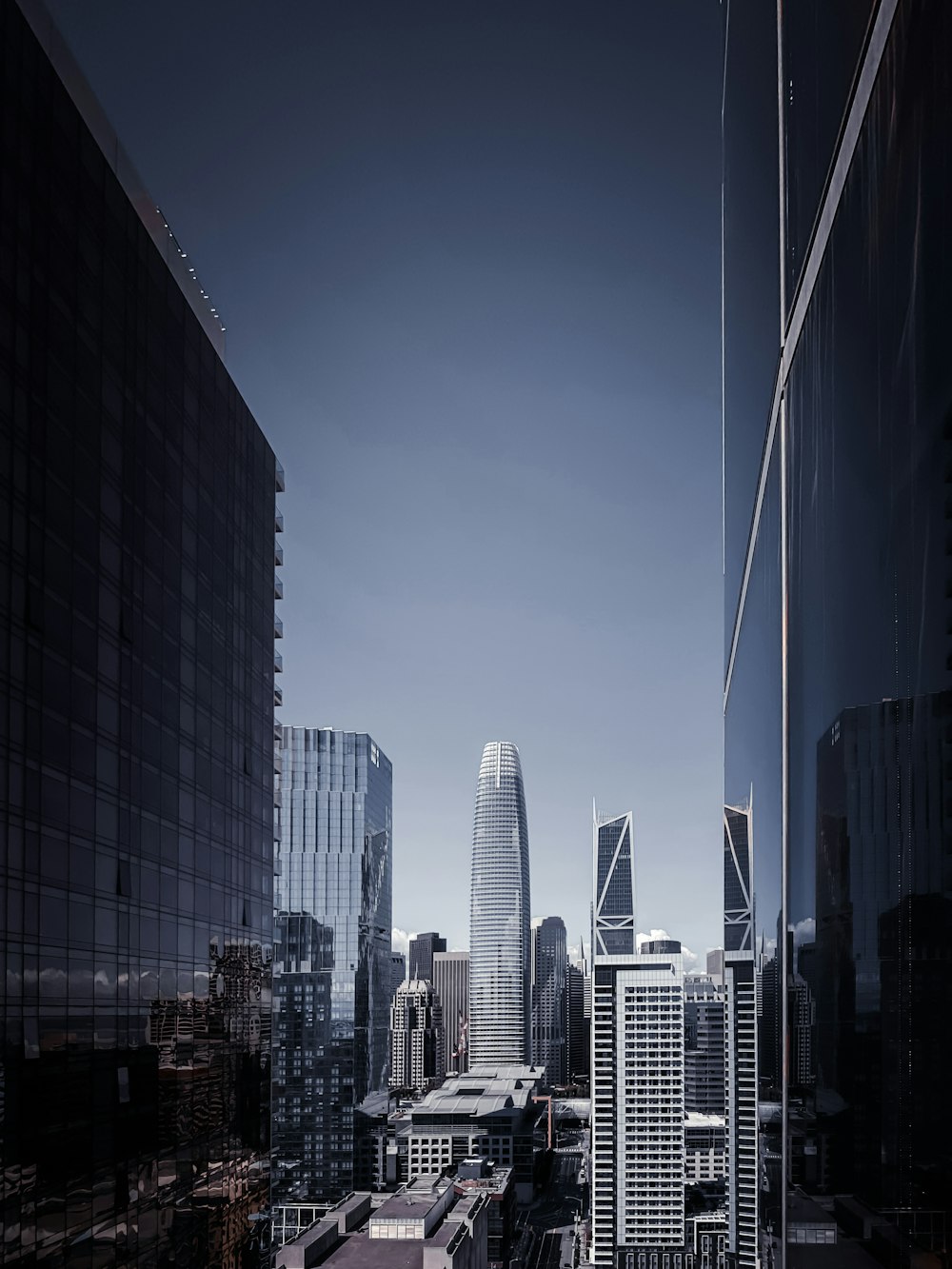 city buildings under blue sky during daytime