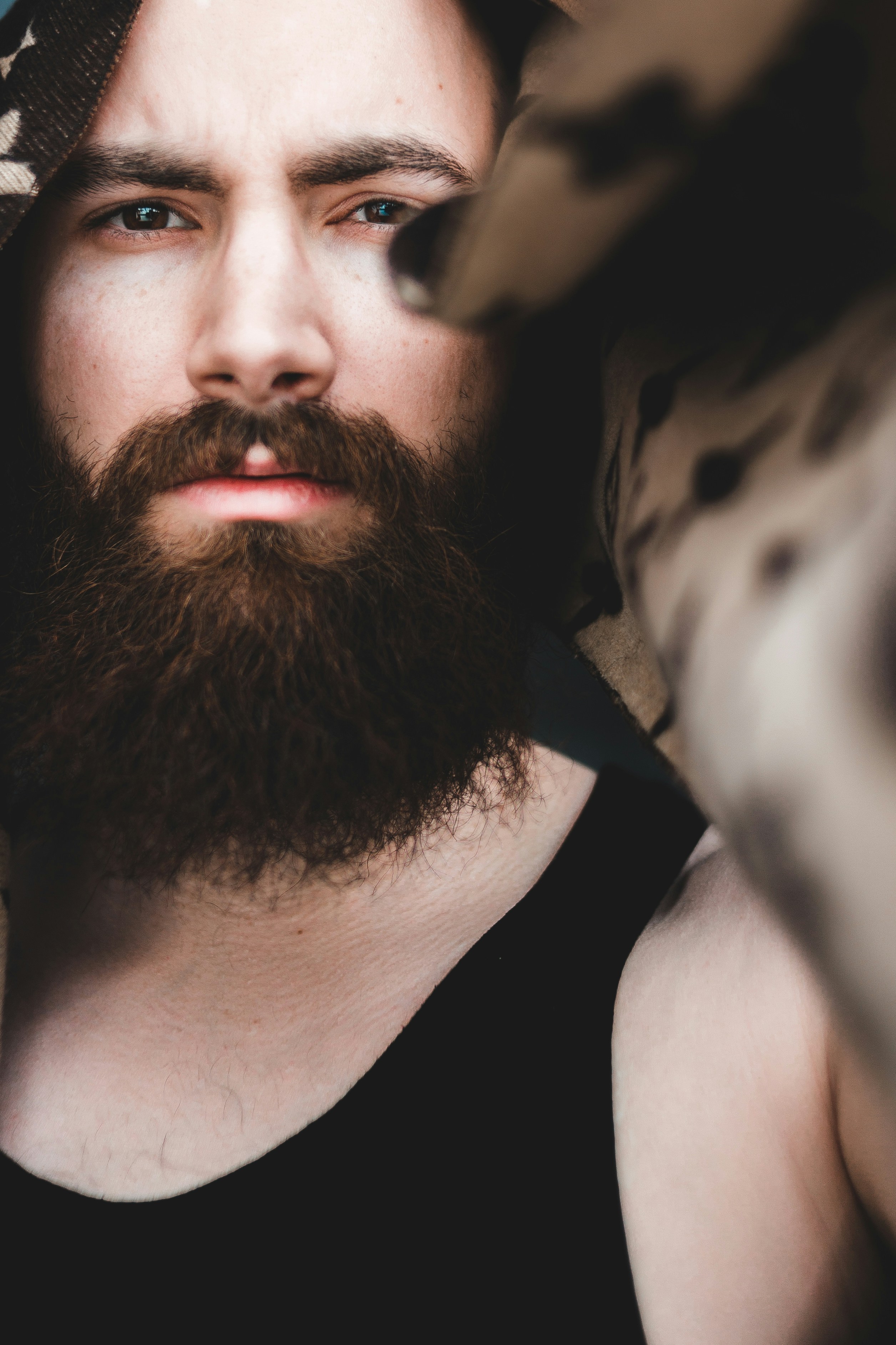 man in black tank top