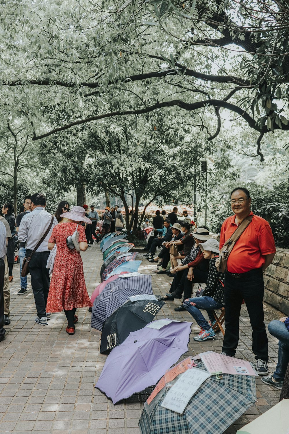 people walking on sidewalk during daytime