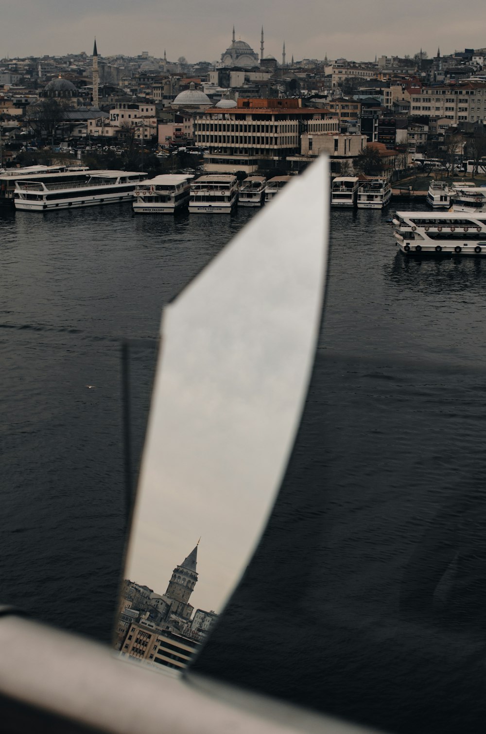 white boat on body of water during daytime