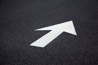 arrow on fresh sealcoat asphalt