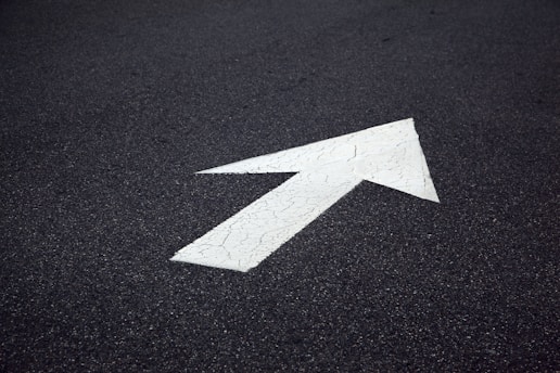 arrow on fresh sealcoat asphalt