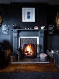 black fireplace with brown wooden frame