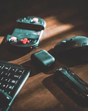 A selection of custom printed tech gadgets including phone cases and USB drives.