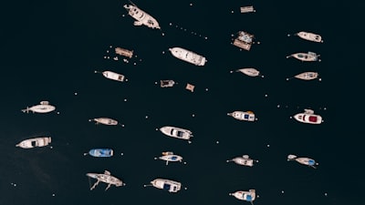 blue and white boat on water spaceship teams background