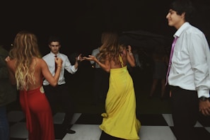 Guests enjoying a dance floor during a quinceañera event.
