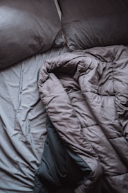 blue bed linen on bed