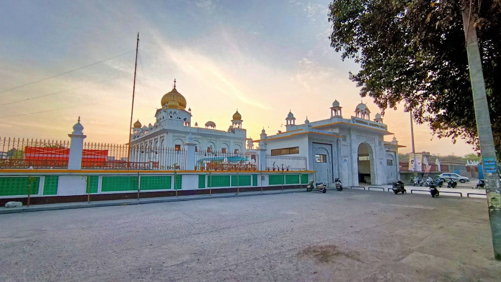 a large white building with a golden dome