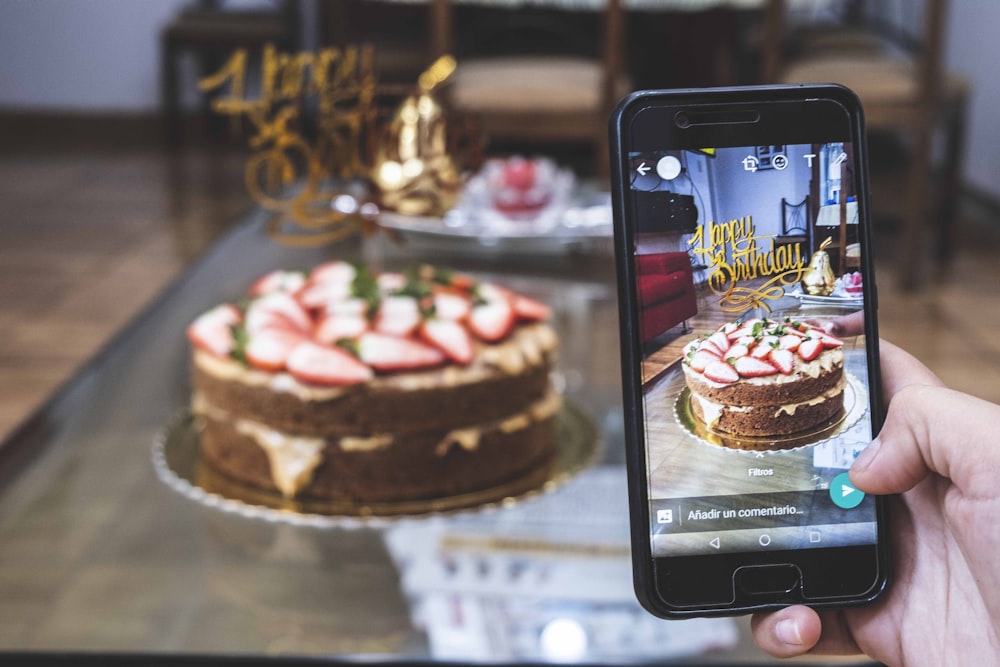 black samsung android smartphone displaying chocolate cake