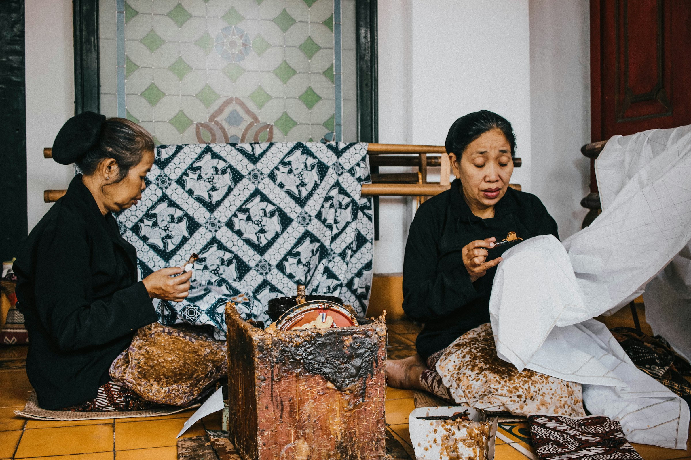 Women making batik at the Yogyakarta keraton.