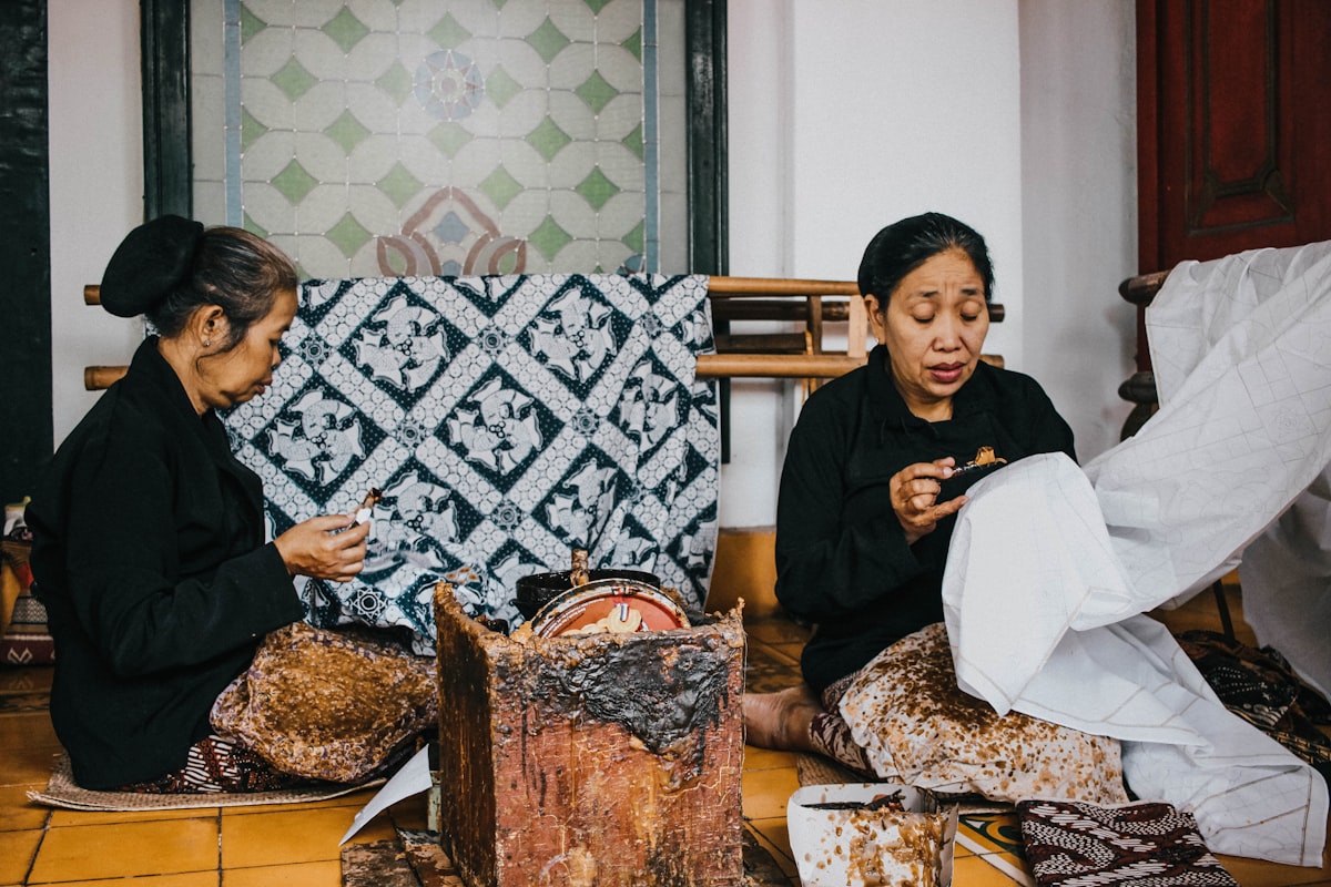 Yogyakarta November — batik artisans at work in Keraton workshop