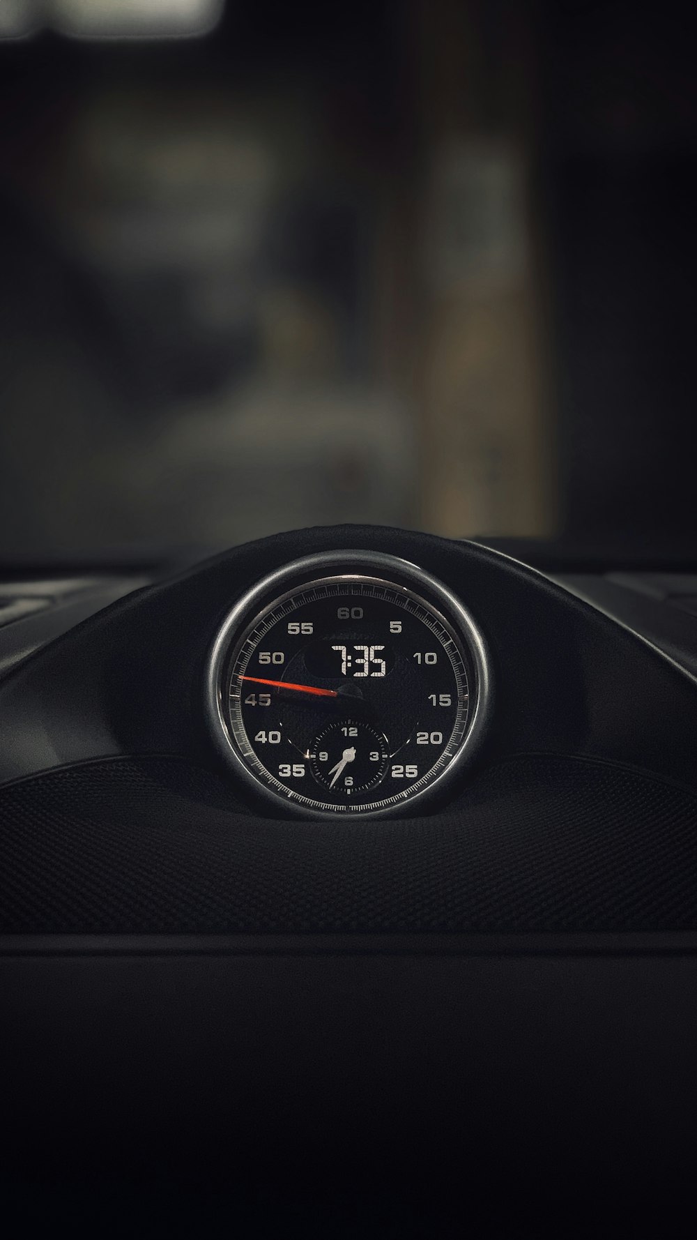 black and white car speedometer