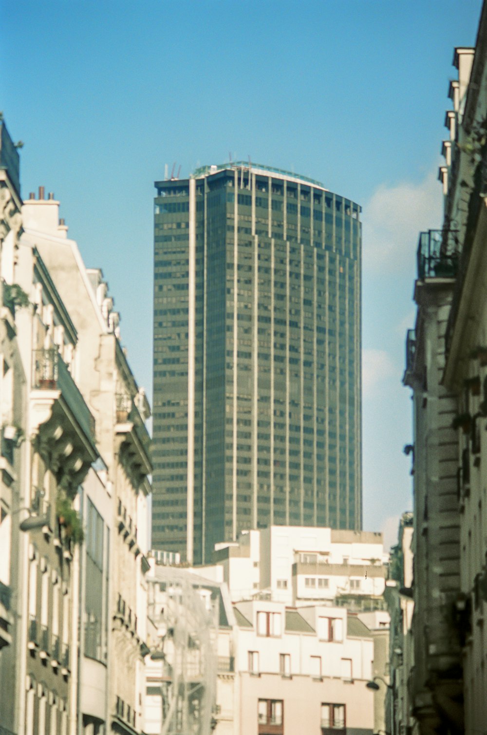 white concrete building under blue sky during daytime