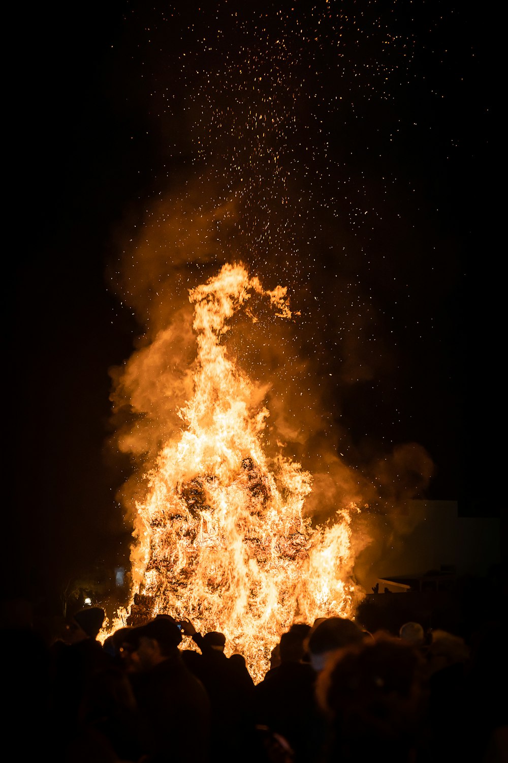 fire in the sky during night time