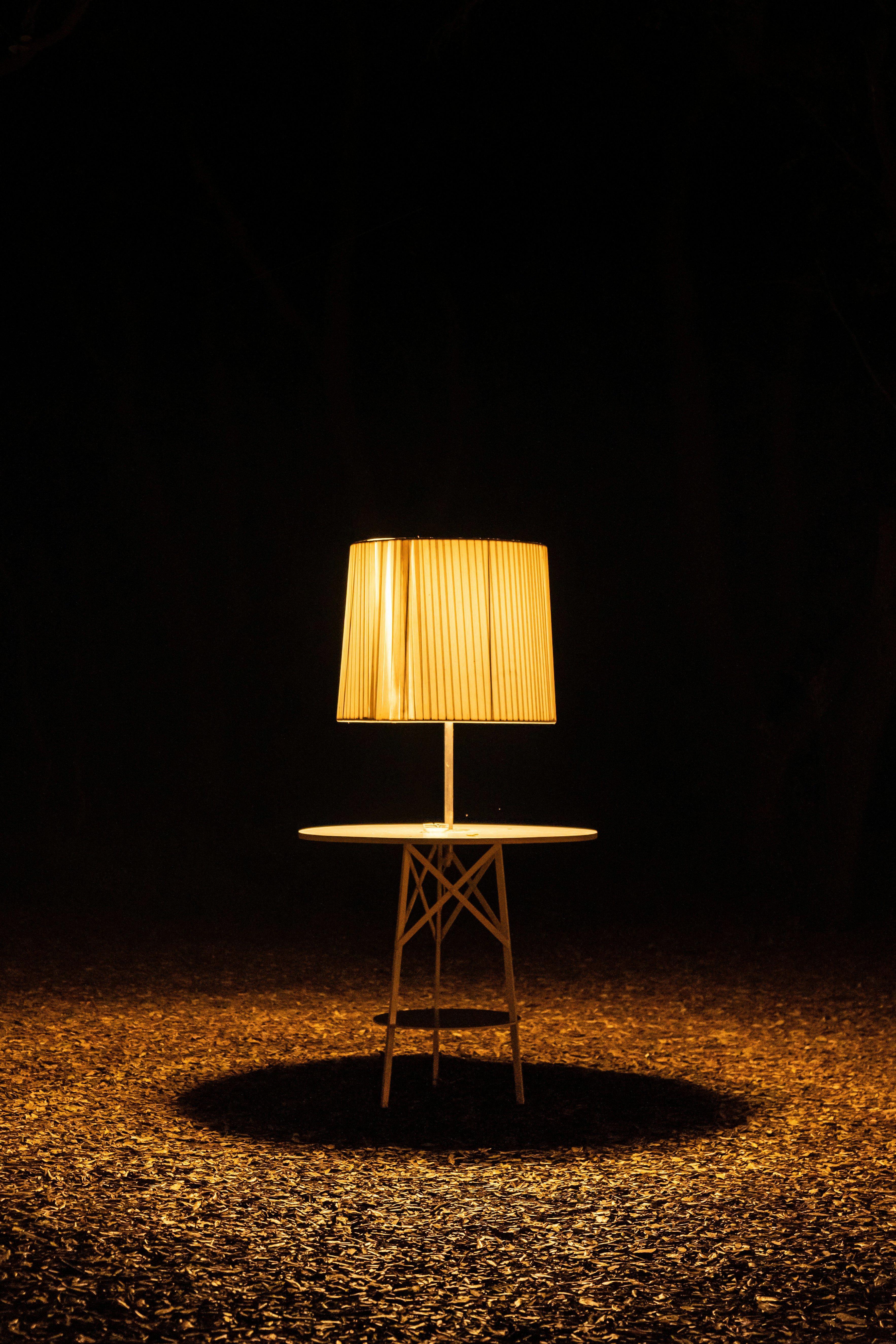 brown wooden chair with brown lampshade