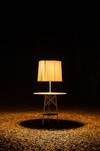 brown wooden chair with brown lampshade