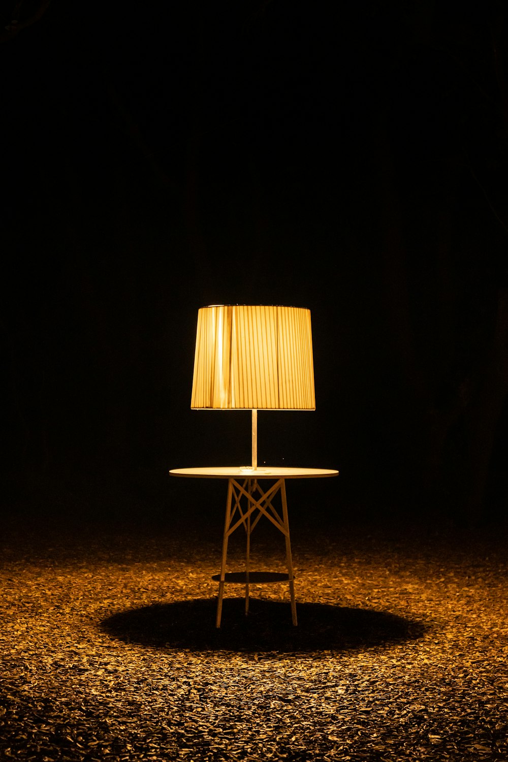brown wooden chair with brown lampshade